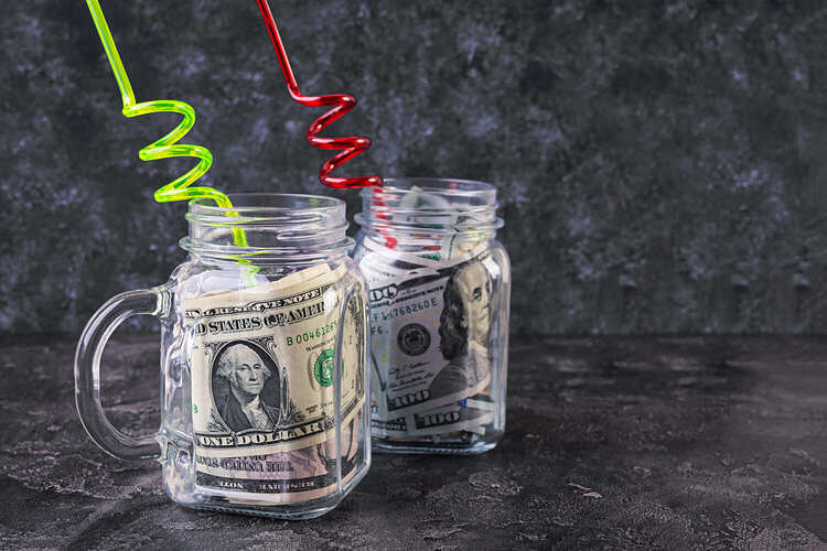 business concept money in jar crisis devaluatio utc