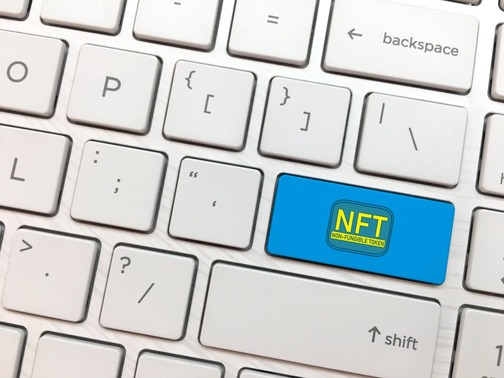 computer keyboard enter button with nft symbol no utc