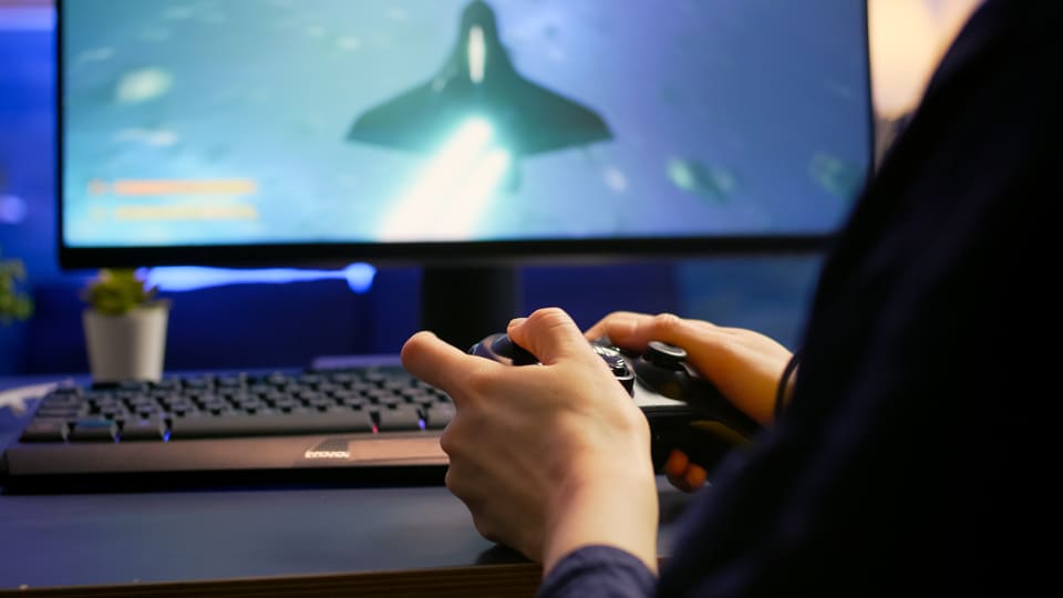 close up of professional cyber gamer playing space utc
